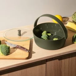 Eva Solo Stoommandje Voor Magnetron Green Tools ø 22 X 9 Cm -Westmark Winkel Eva Solo Green Tool Daempfer fuer die Mikrowelle Situation 2